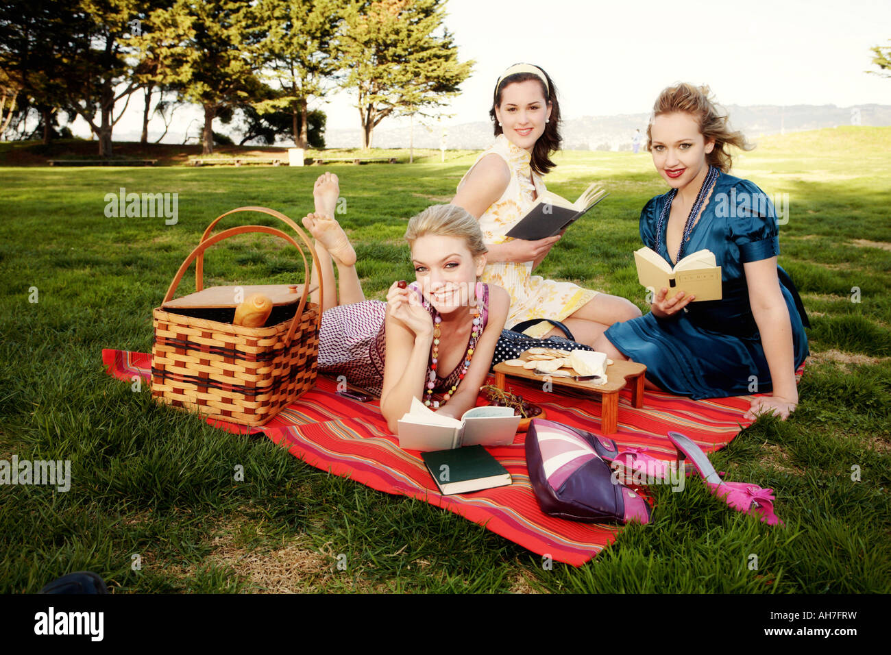 Three young women at a picnic Stock Photo Alamy
