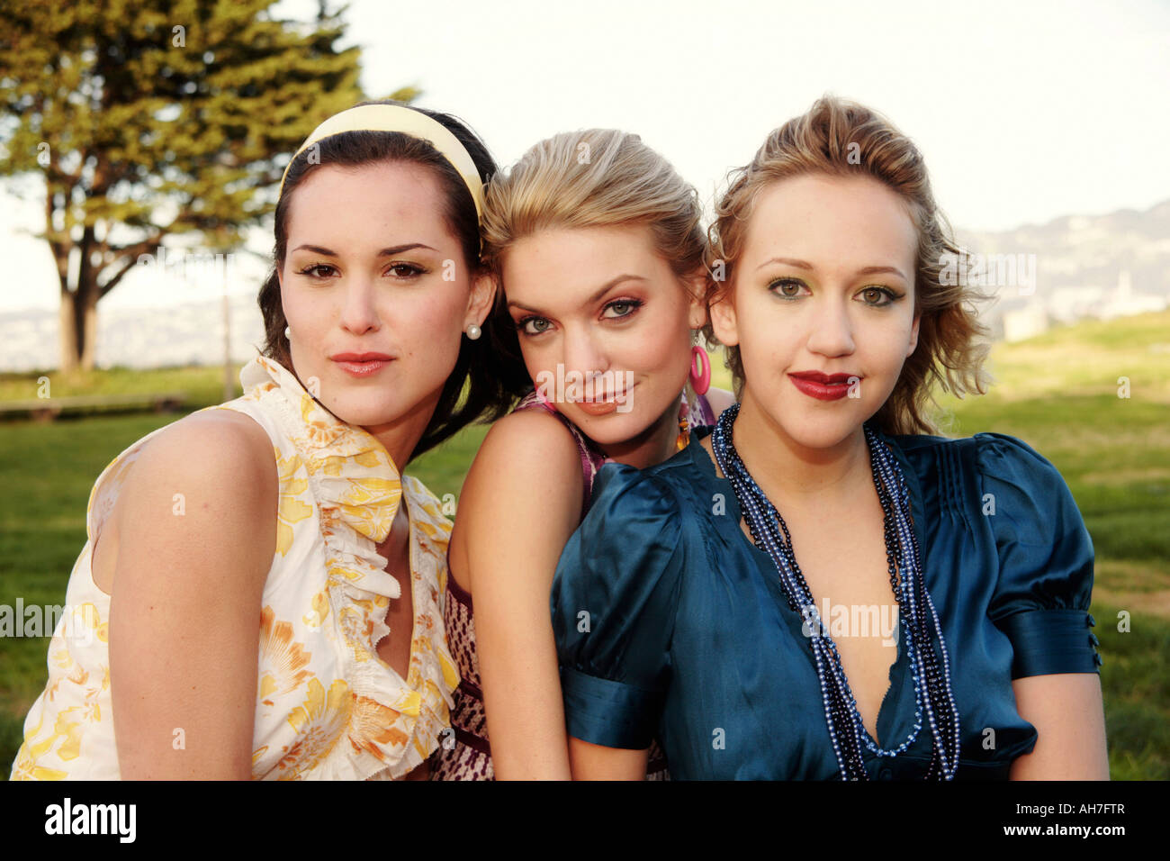 Three young smiling women hi-res stock photography and images - Alamy