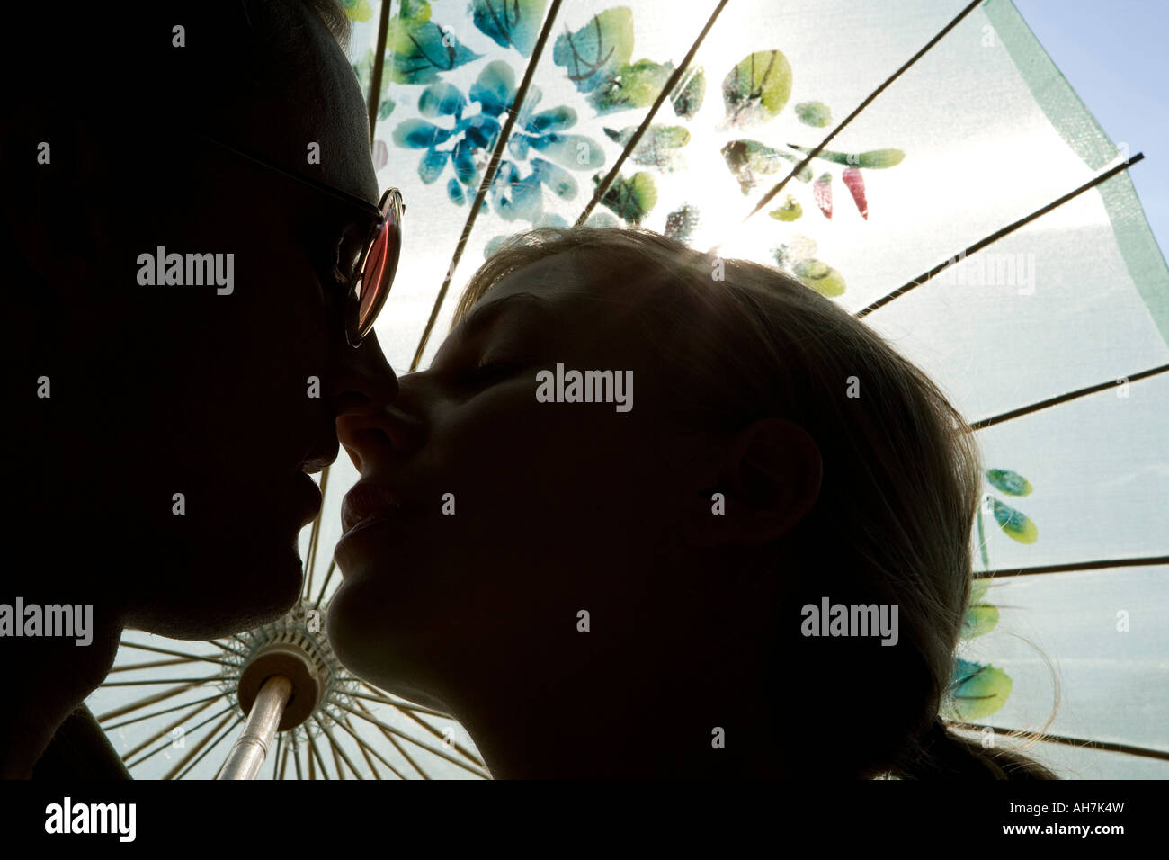 Couple kissing silhouette close up hi-res stock photography and images ...