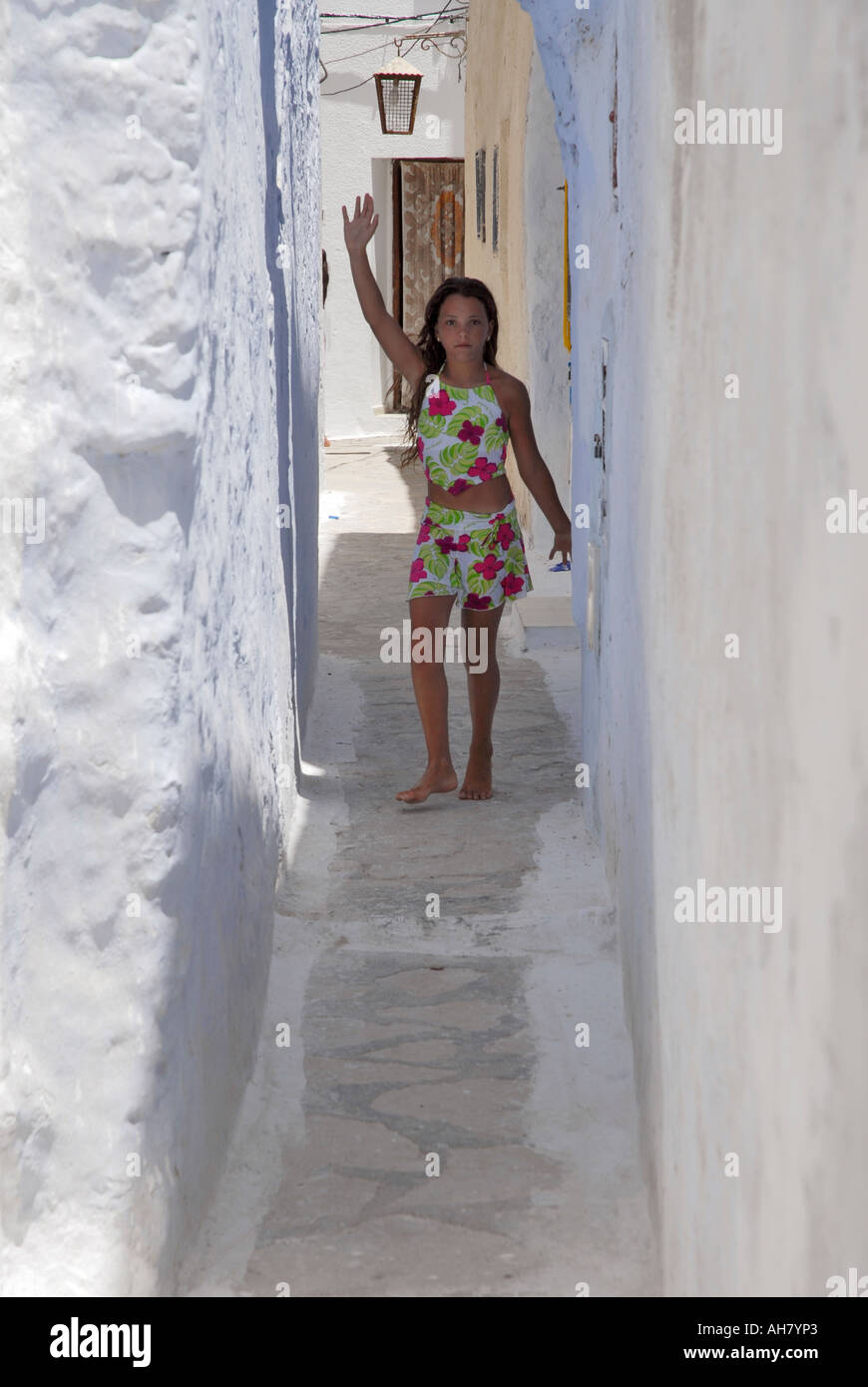 local girl poses in the back streets of Hammamet in northern Tunisia Stock Photo