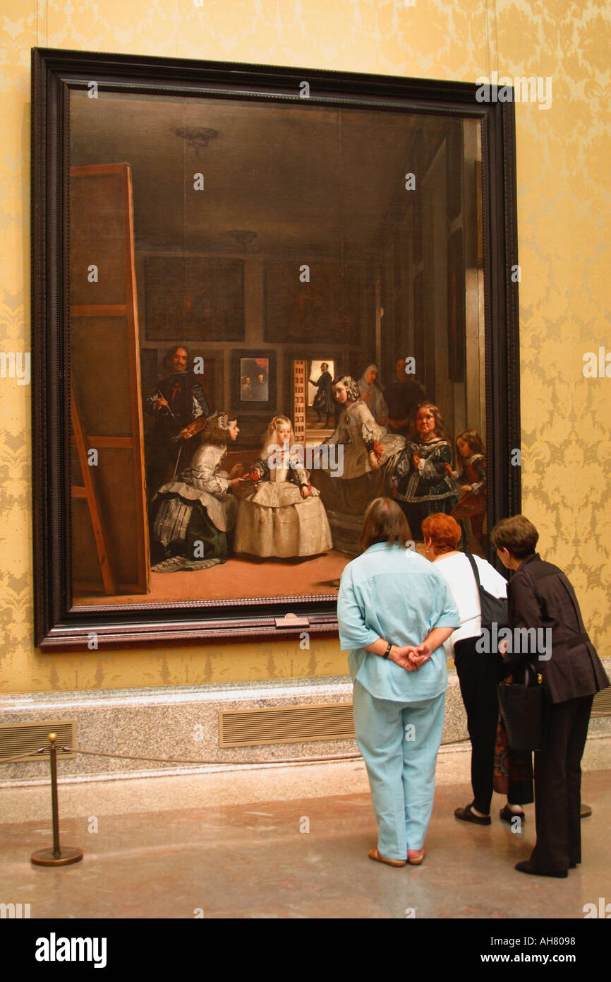 Madrid, Spain.  El Prado Museum.  Visitors studying Las Meninas by Diego Velasquez. Stock Photo