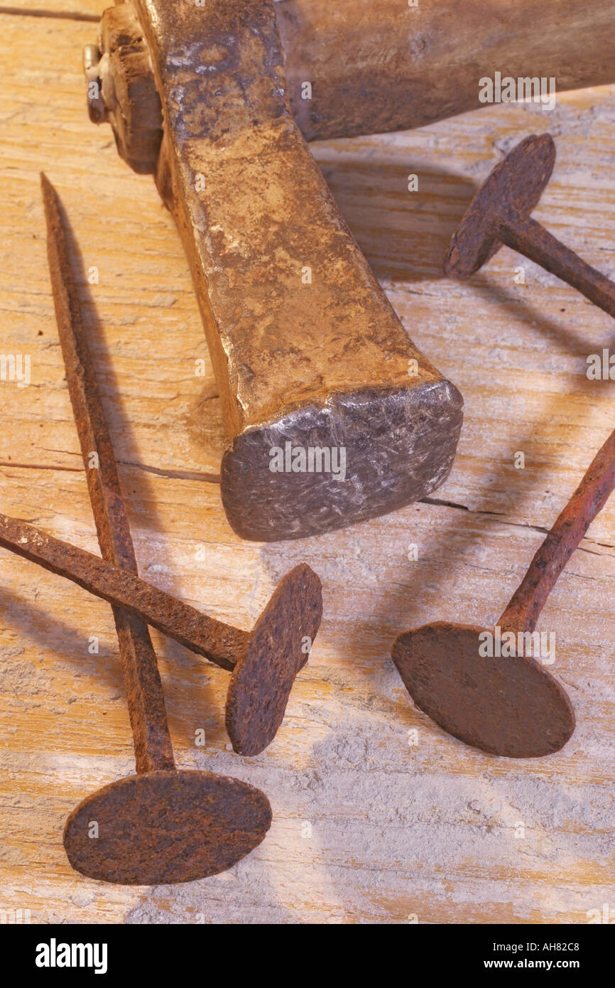 Hammer and antique nails Stock Photo Alamy