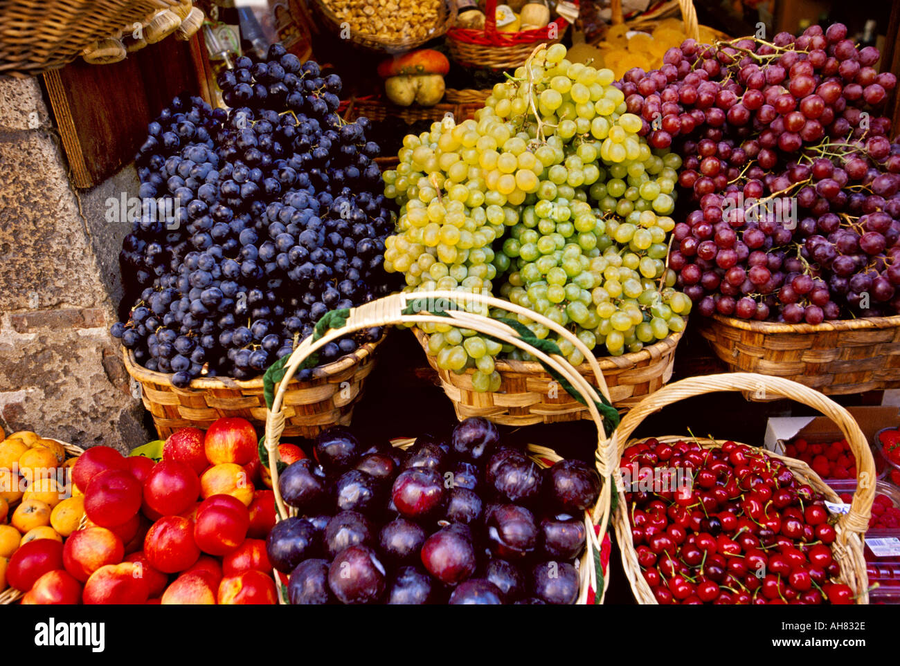 Fruit grapes cherries plums Stock Photo
