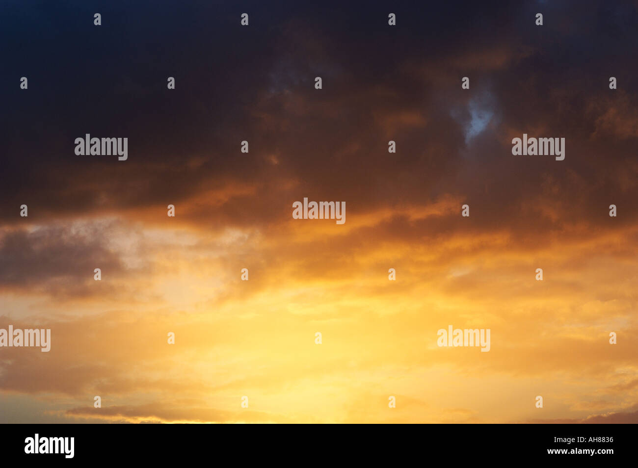 Evening clouds in blue sky Stock Photo - Alamy