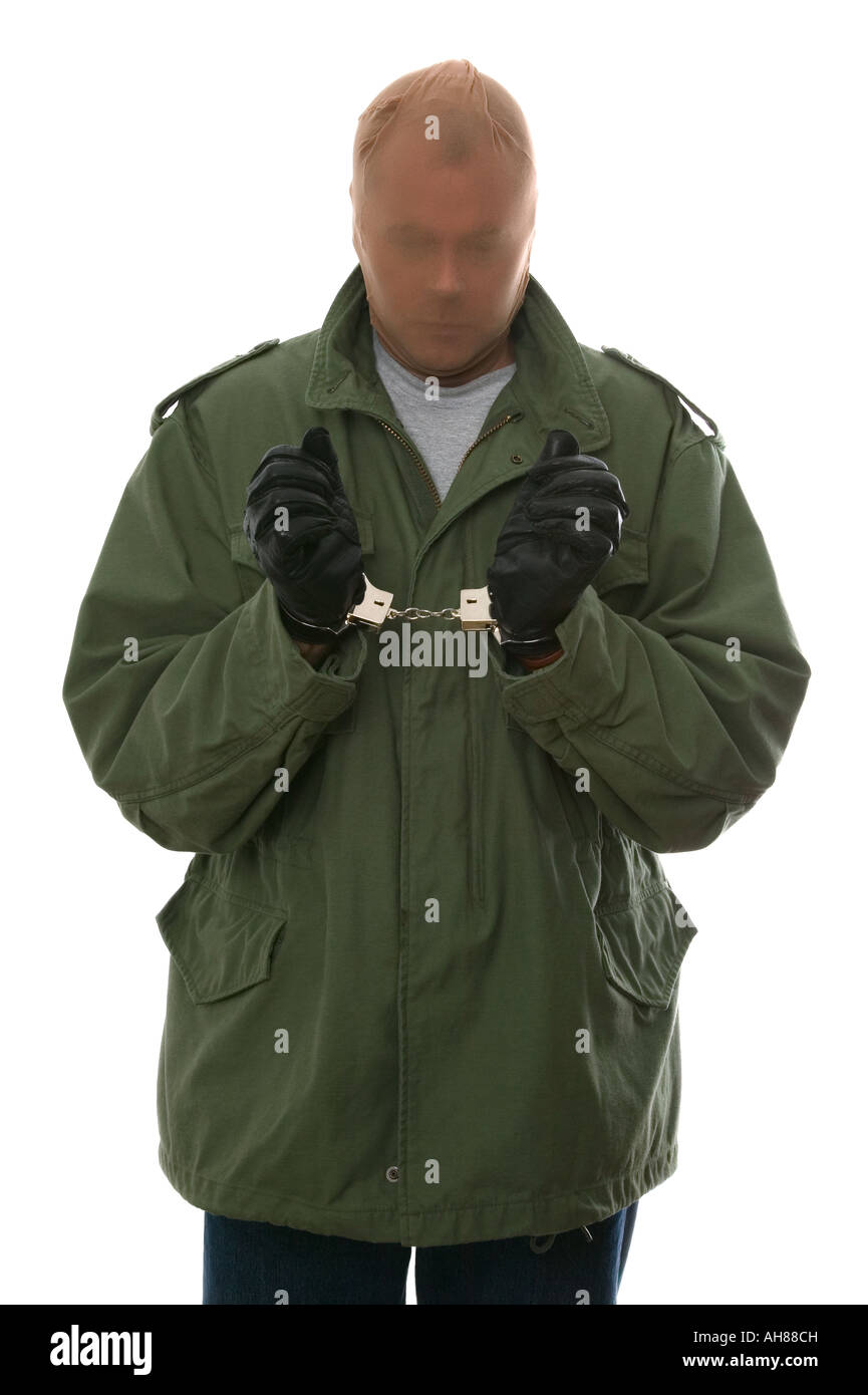 Captured bank robber in handcuffs Isolated on white Stock Photo
