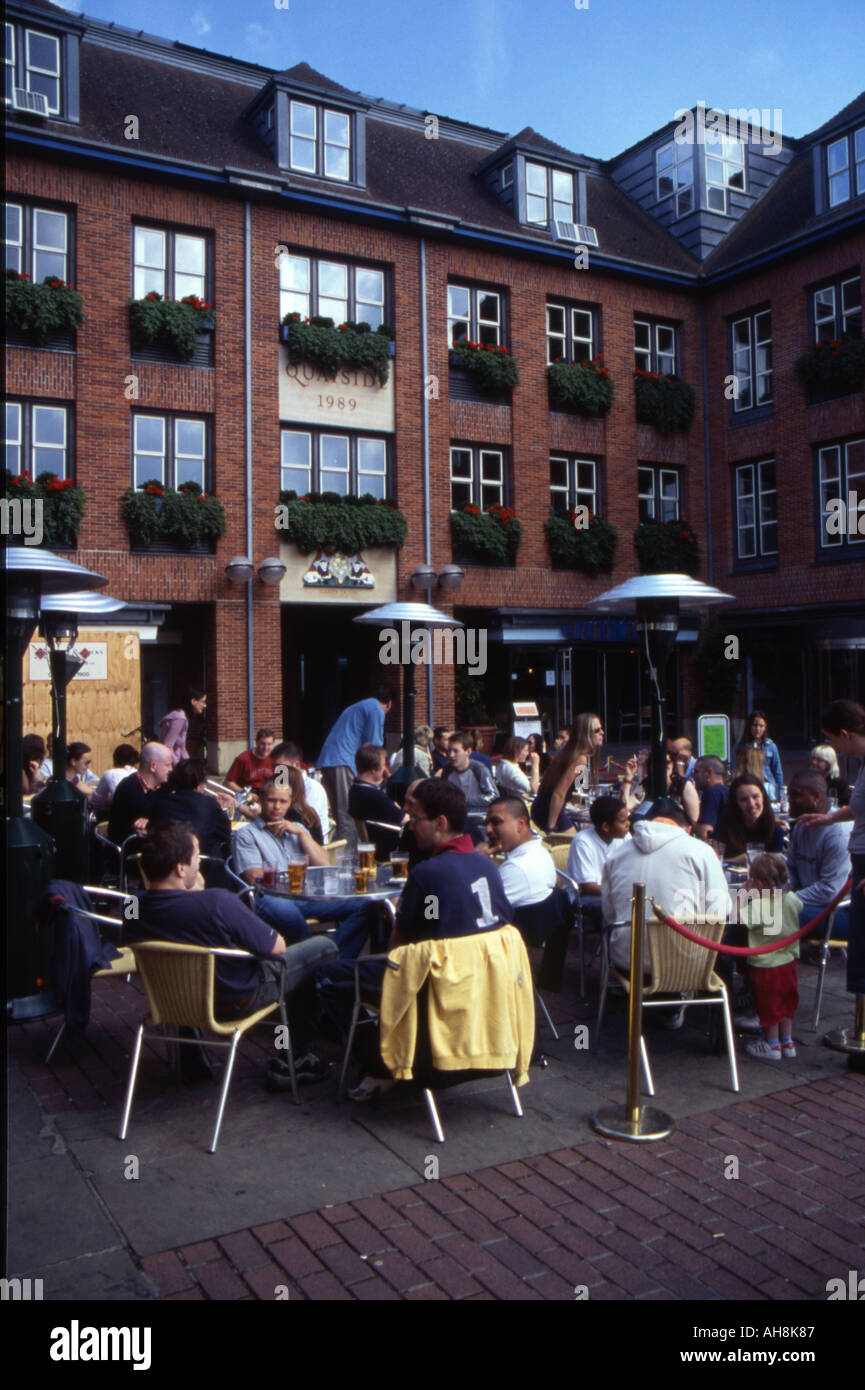 On a sunny summer day Cambridge students can be found not in lectures but sitting outside the pubs. Stock Photo