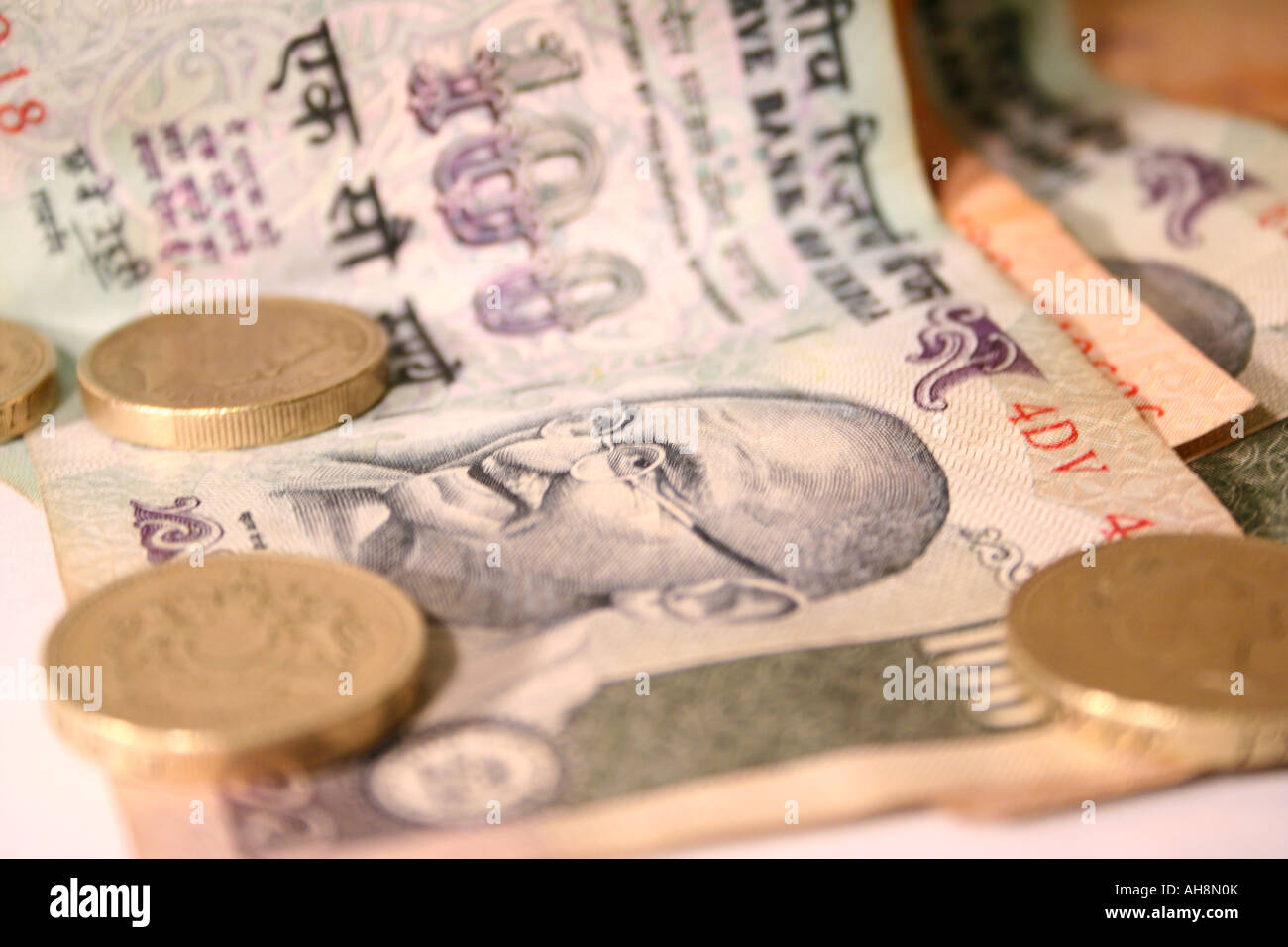 A collection of Indian notes and coins stacked together Stock Photo - Alamy