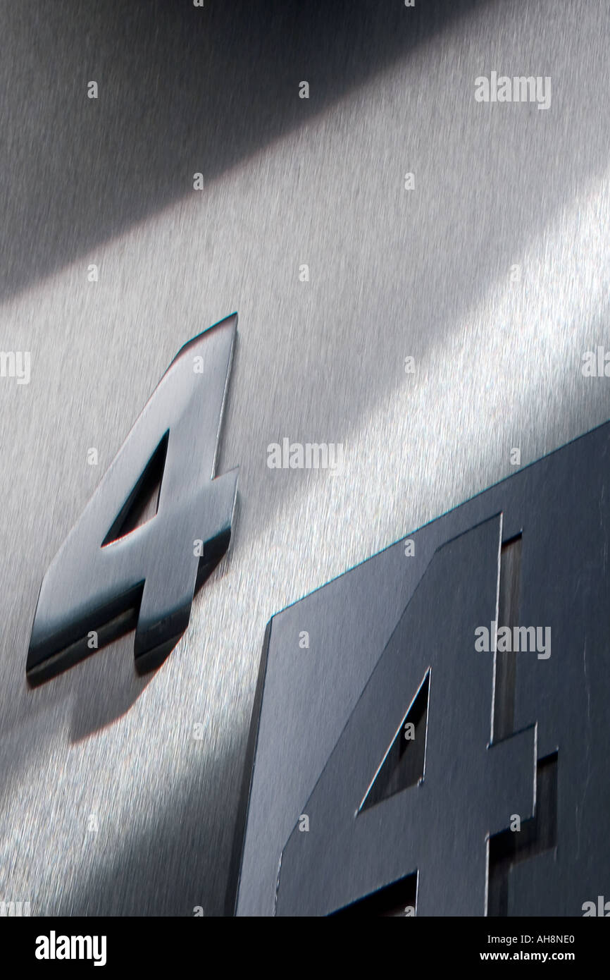 AAD71543 number 4 four Metal Brushed steel Stock Photo