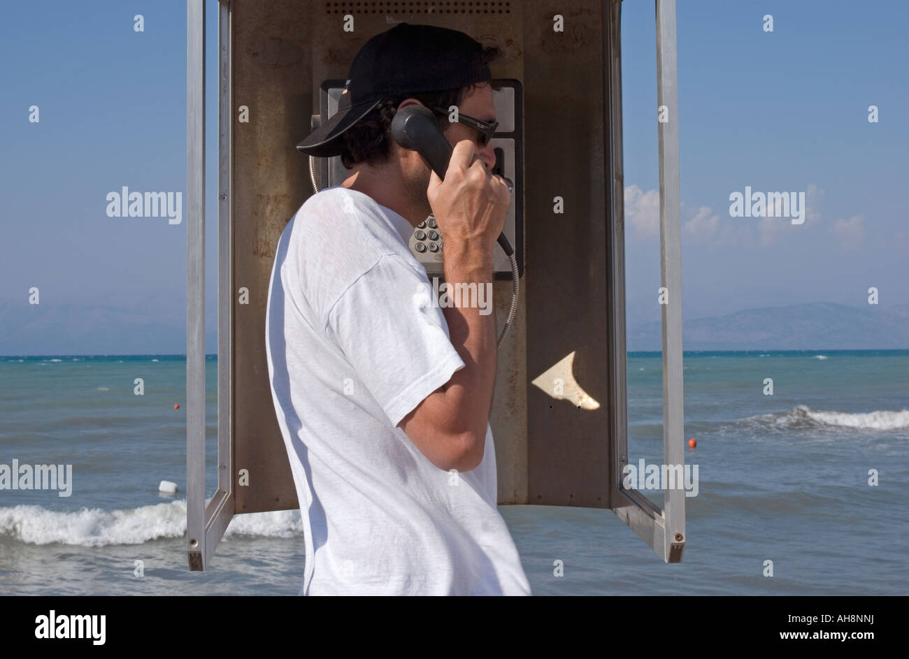 Man talking in telephone booth hi-res stock photography and images - Alamy