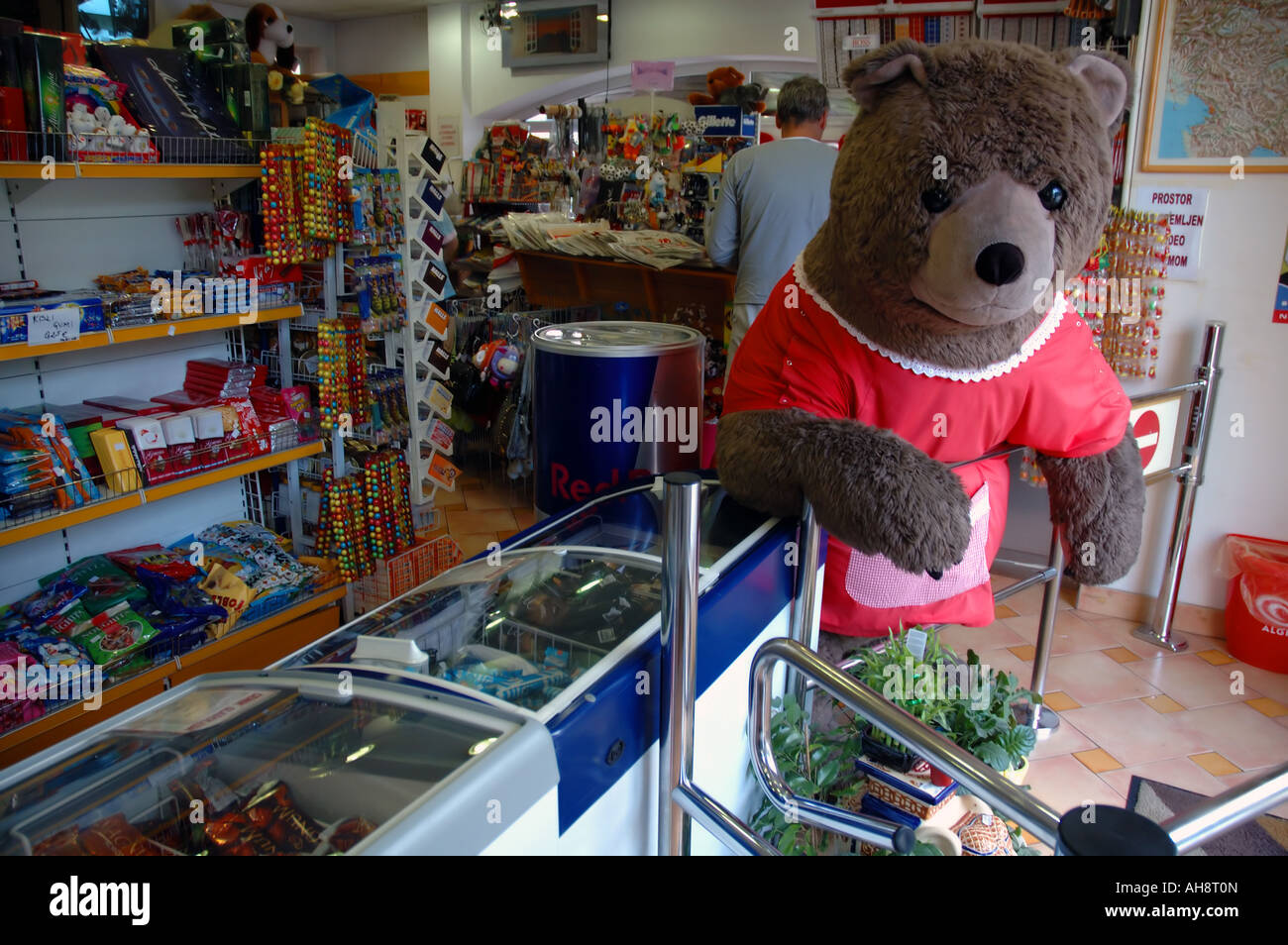 Giant teddy bear greets customers at the entrance to supermarket Trojane Slovenia No PR Stock Photo
