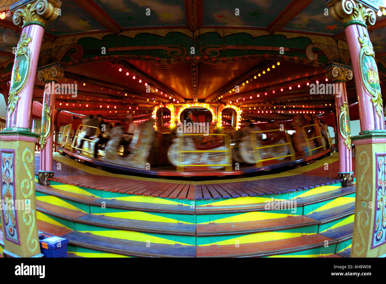 Fairground ride fun funfair movement blur blurred blurring motion speed Stock Photo