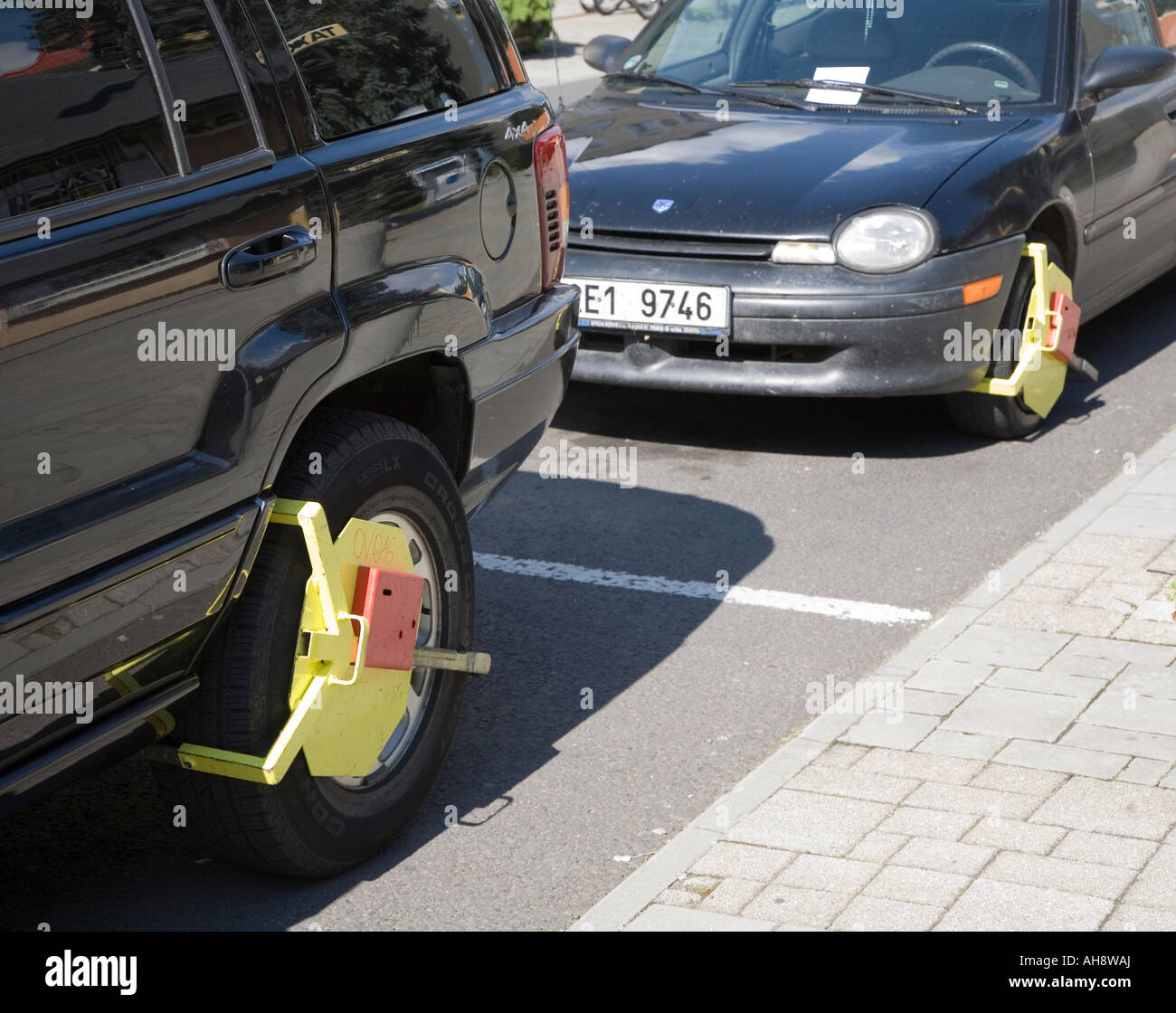 Clamped cars in parking zone with ticked on windscreen Frantiskovy