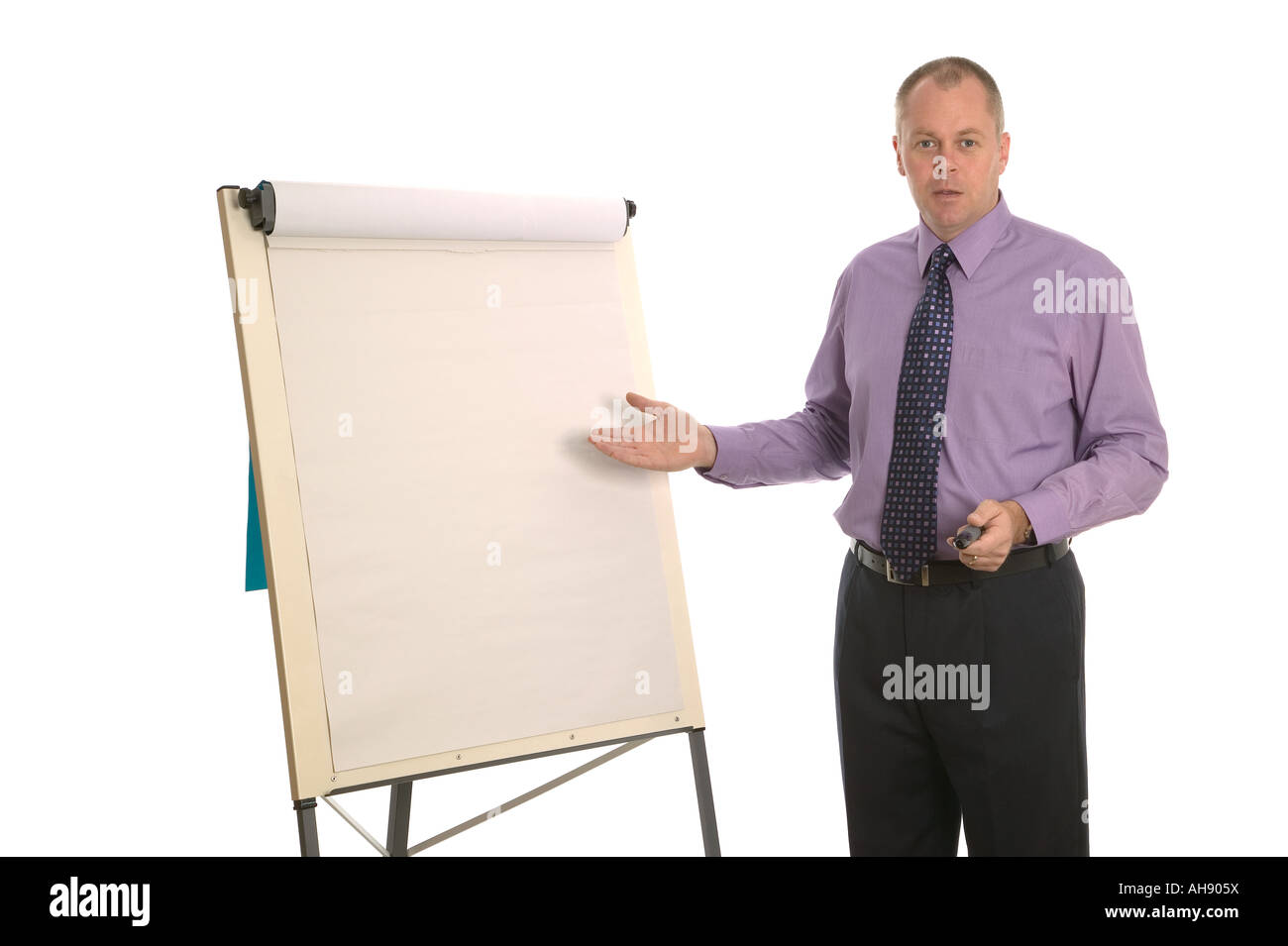 Businessman giving a presentation using a flip chart blank for your own text Stock Photo