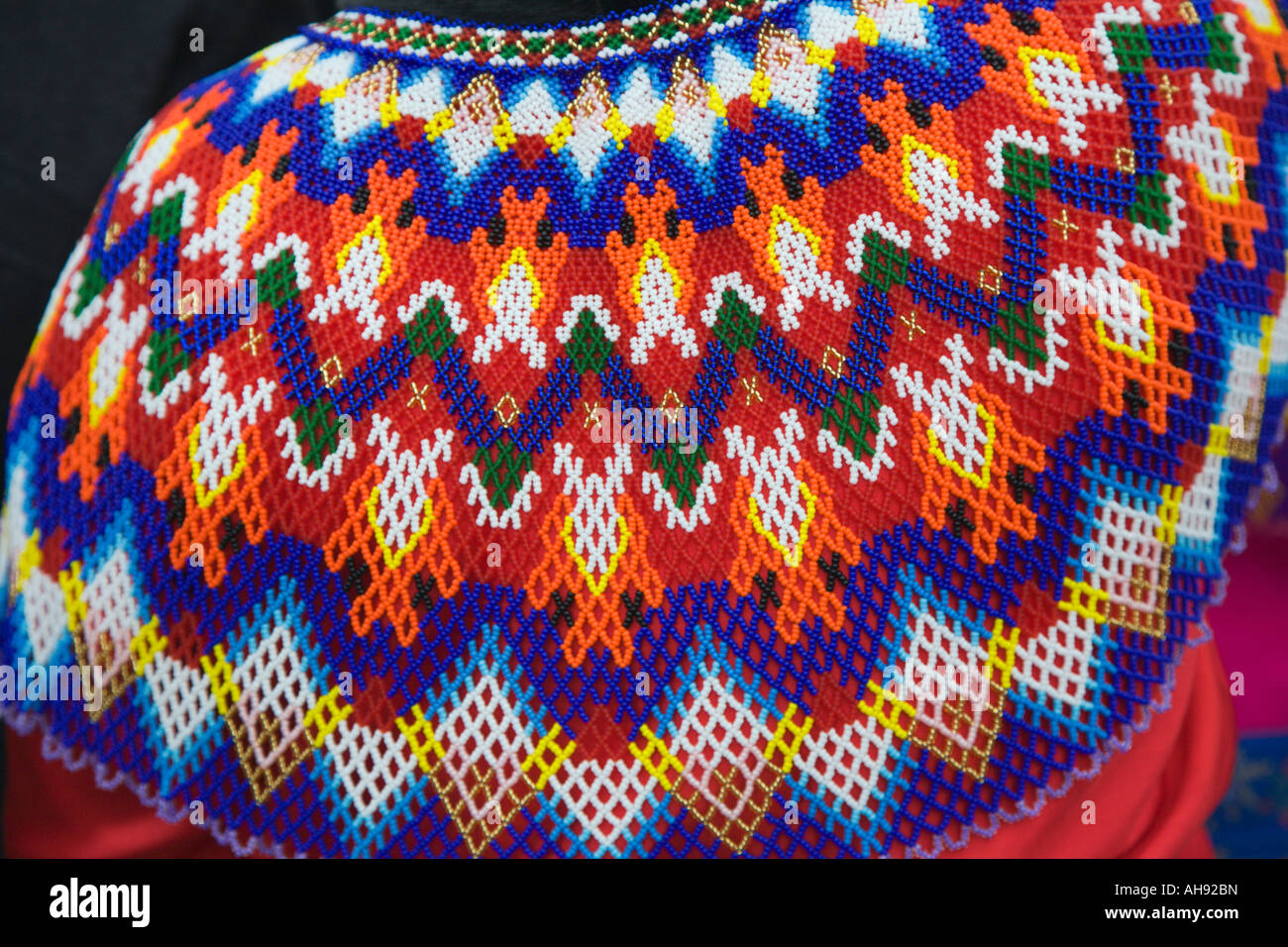 Close up of beautiful intricate and fine detail worn around the ...