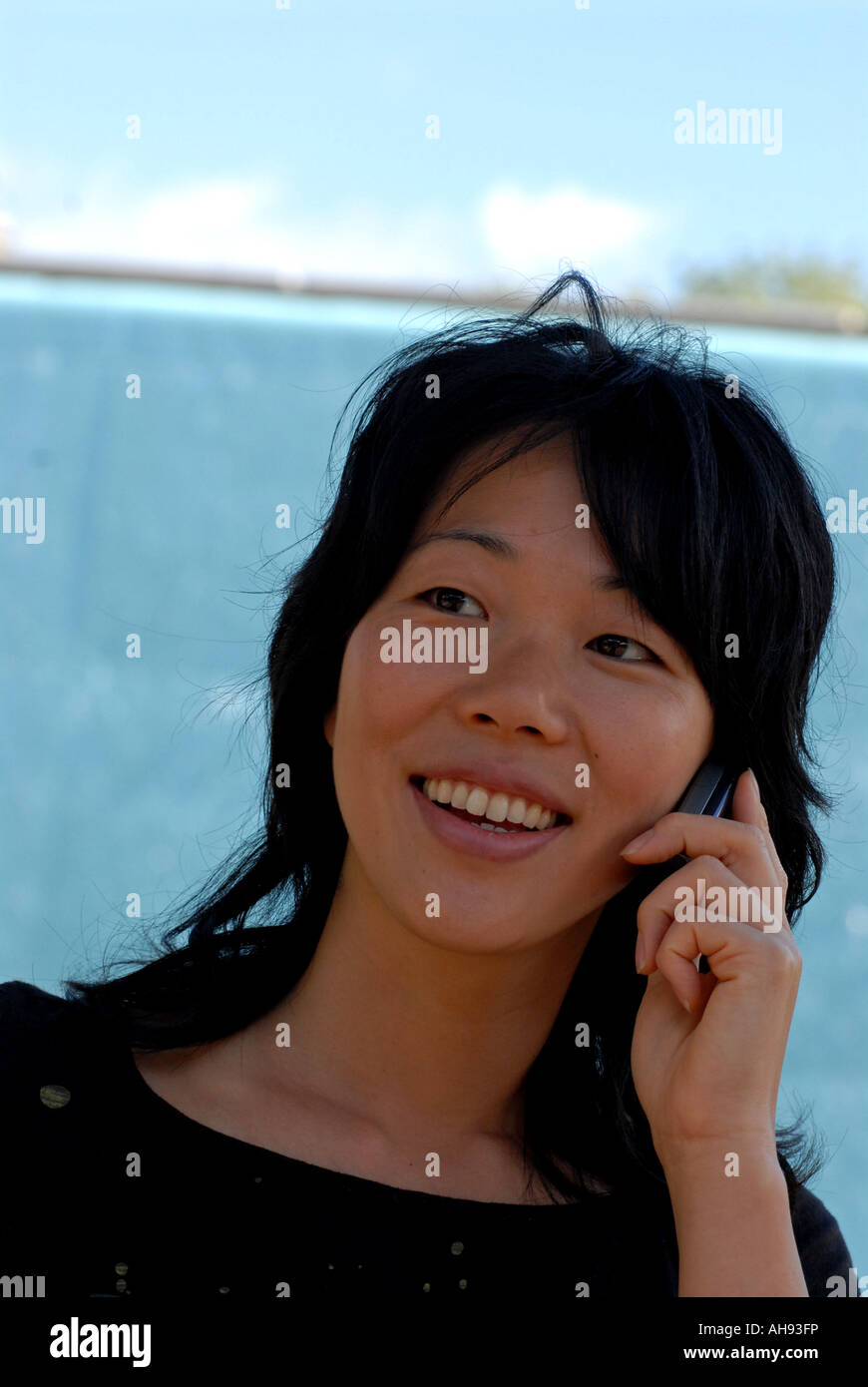 Woman talking on the phone Stock Photo
