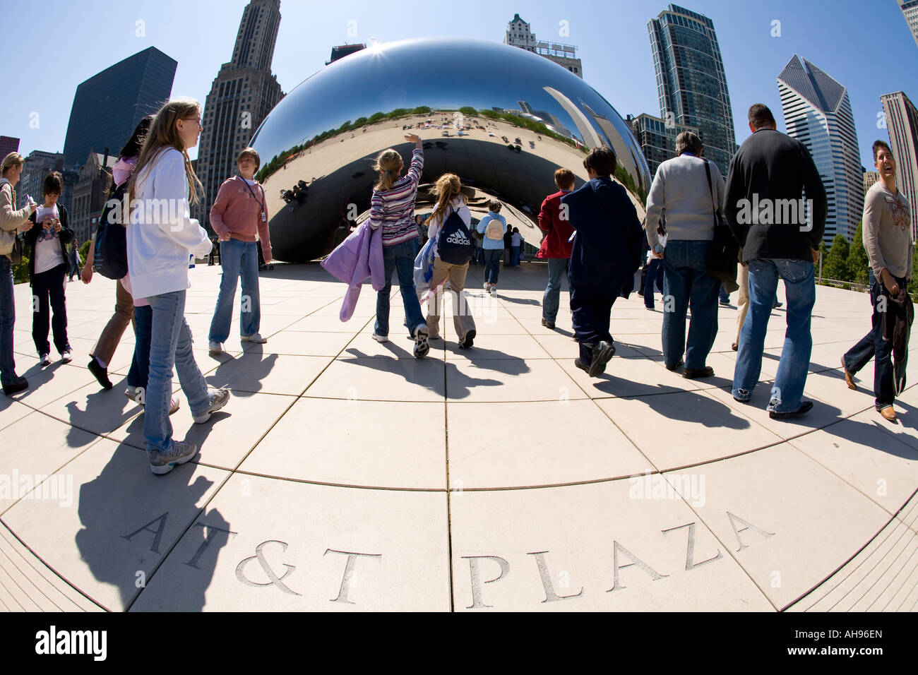 ILLINOIS Chicago AT T Plaza etched in stone near Bean sculpture plaza at Millennium Park students on trip Stock Photo