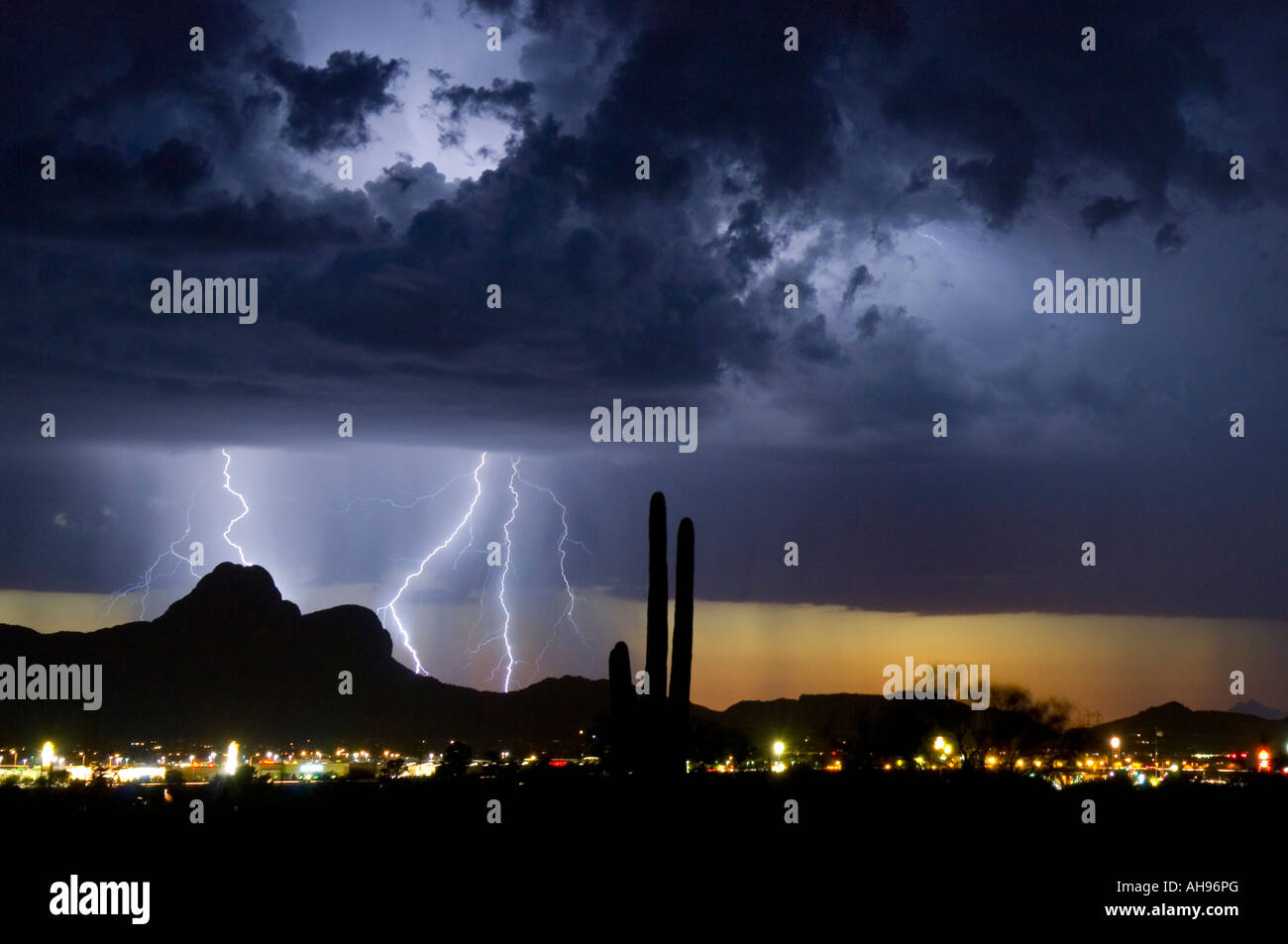 Lightning storm over desert Stock Photo
