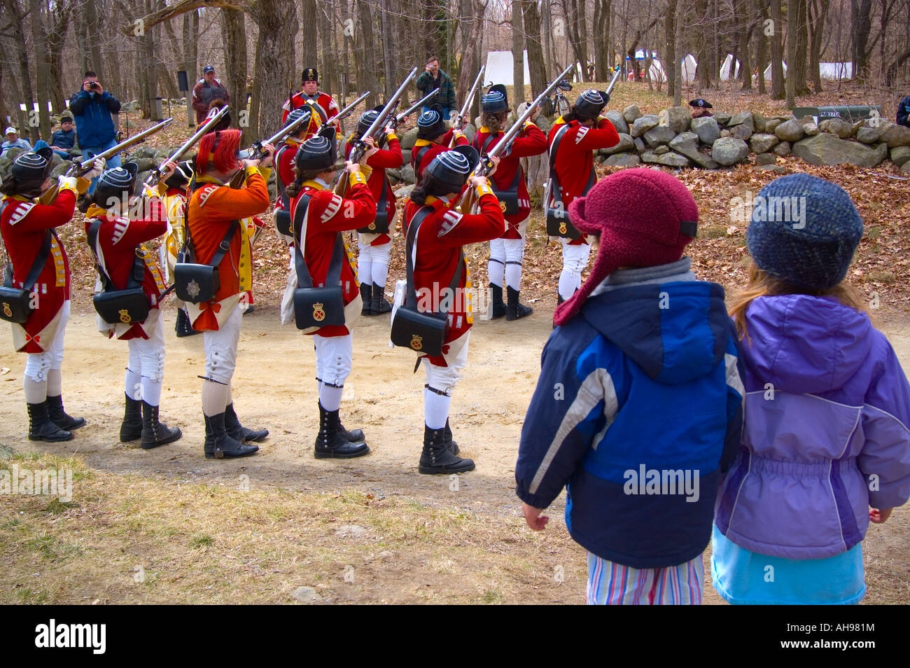 Children watching an American Revolutionary Re-enactment Stock Photo