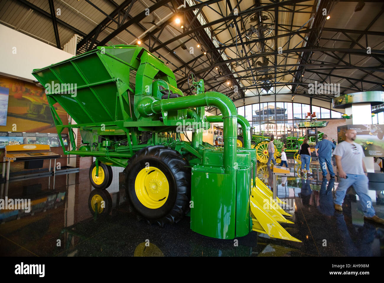 ILLINOIS Moline Visitors view equipment in John Deere Pavilion tractors and harvesting machinery