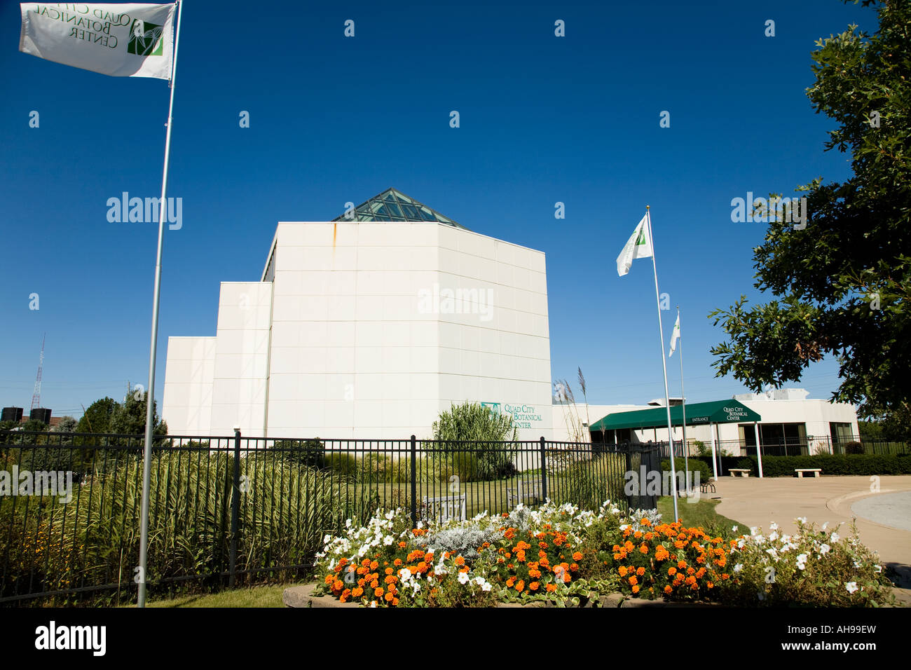ILLINOIS Rock Island Metal fence and flowers blooming along walkway