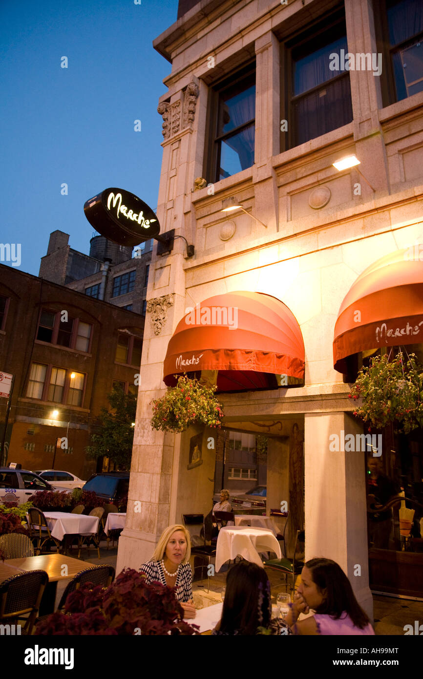 ILLINOIS Chicago Women at table outdoor dining at Marche restaurant on Randolph Street near west side of city Stock Photo