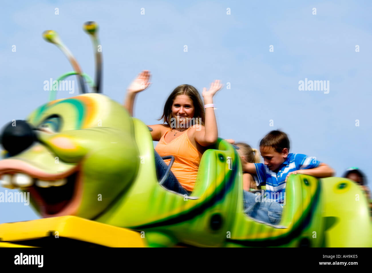Kids on a carnival ride Stock Photo - Alamy