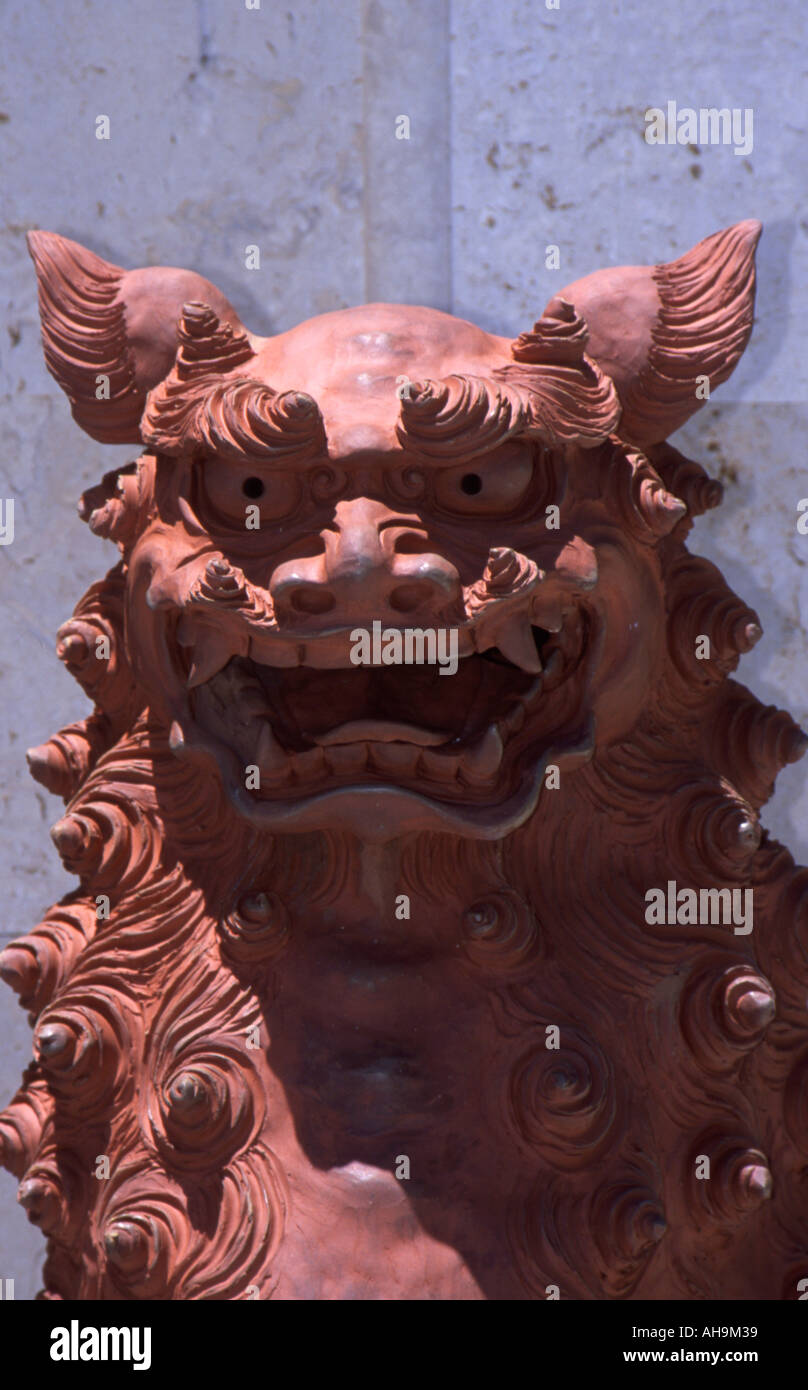 Shisa The Okinawan Lion Dog That Is Found On The Roof Of Buildings For Protection Stock Photo Alamy