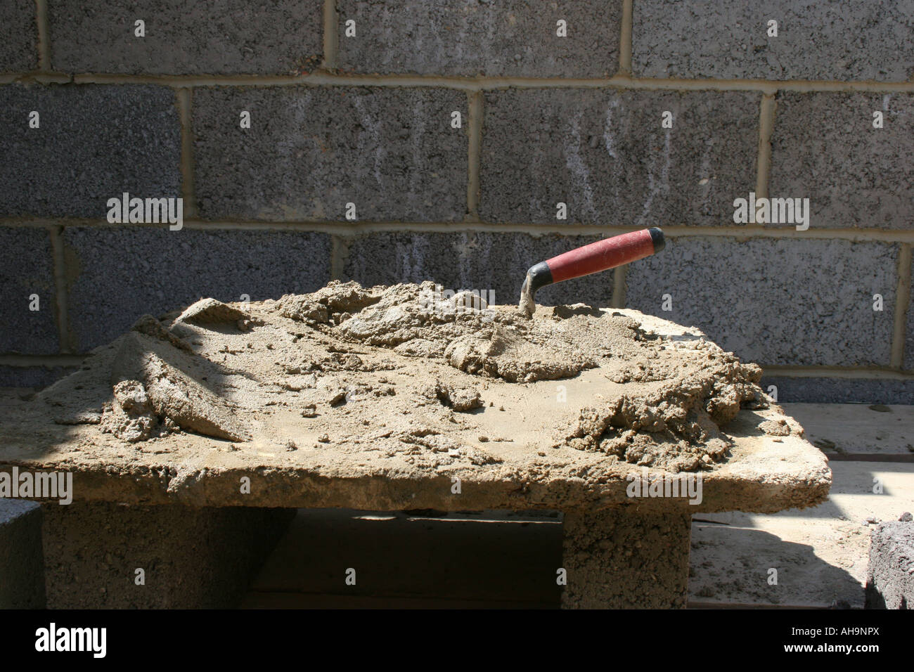 Spot board with mortar and trowel Stock Photo Alamy