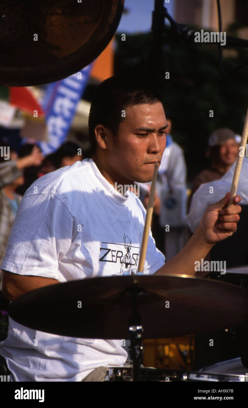 Okinawan man sings at outdoor concert Stock Photo - Alamy