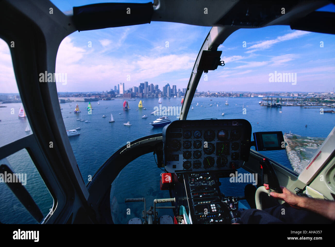 View out a helicopter over Boston harbor and the downtown skyline Stock