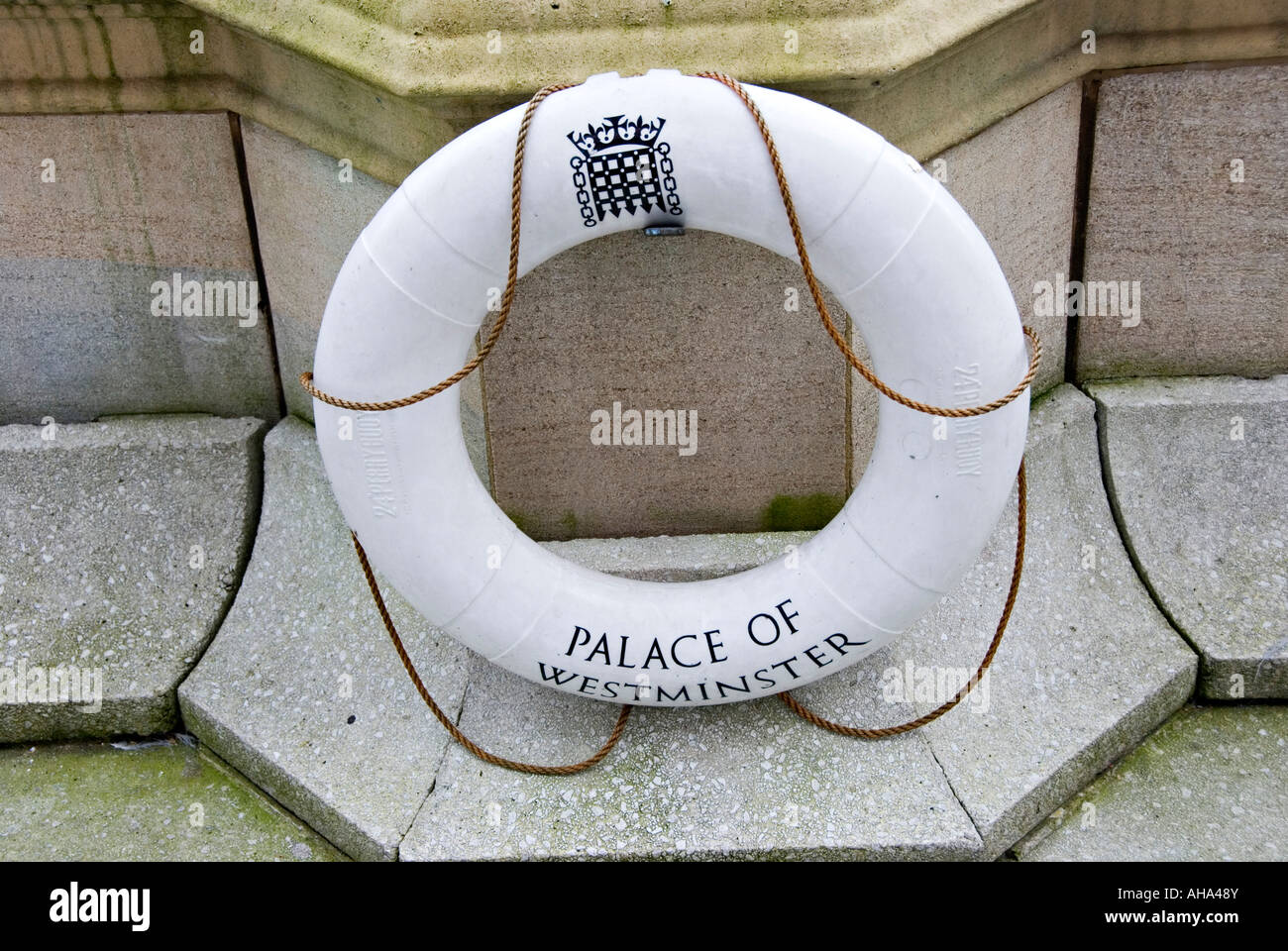 Lifebelt on the House of Commons Terrace at the Houses of Parliament, Westminster, London, UK. The Terrace lies above the River Thames Stock Photo