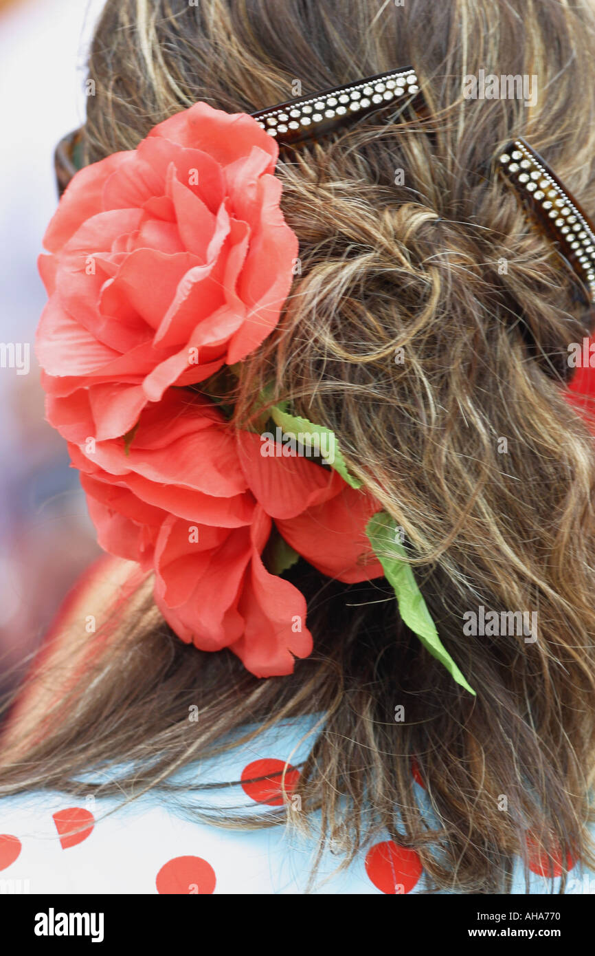 Spain Girl with flower in hair wearing flamenco outfit Stock Photo Alamy