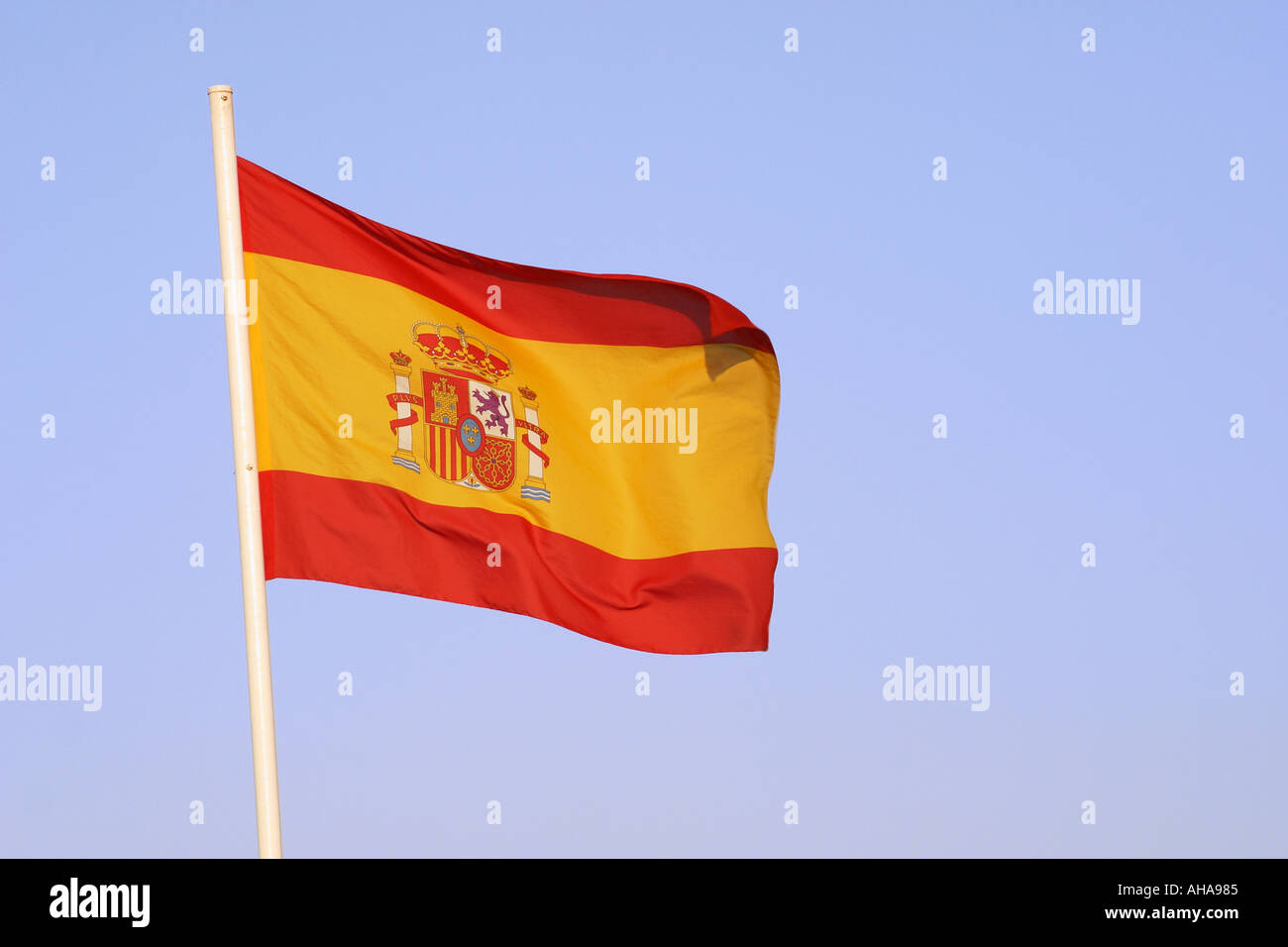Spanish flag against blue sky Stock Photo Alamy