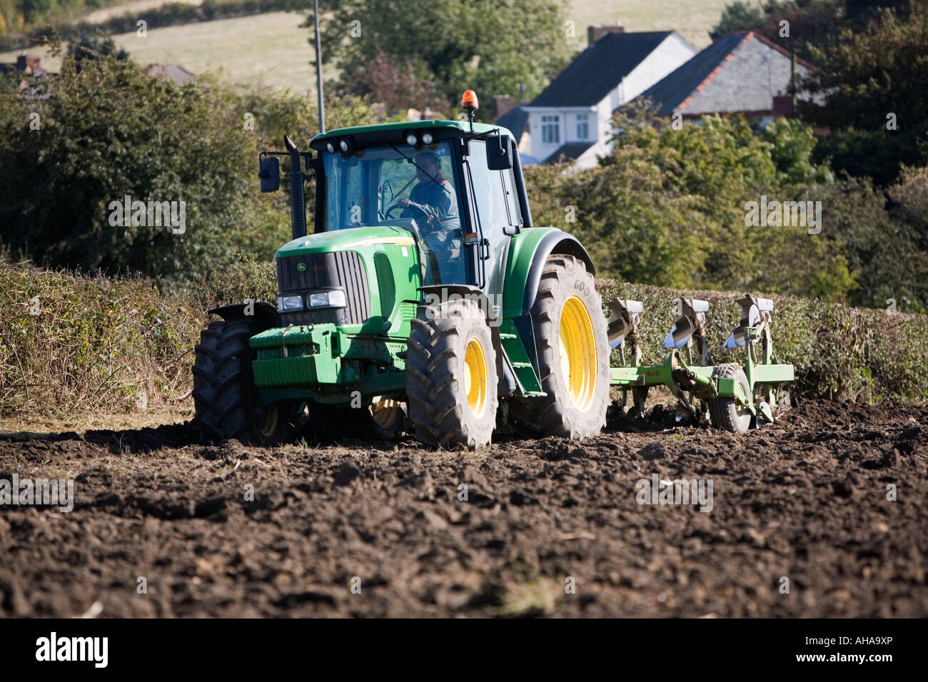 Tractor and plough October Stock Photo