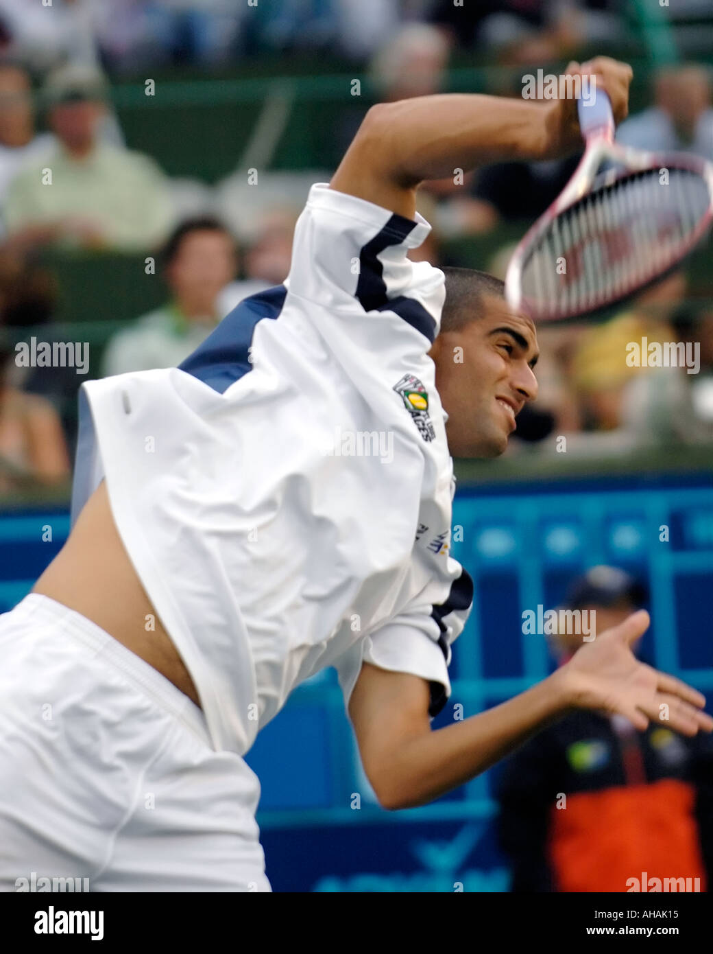 Andy Ram ATP professional tennis player follows through on a powerful serve Stock Photo