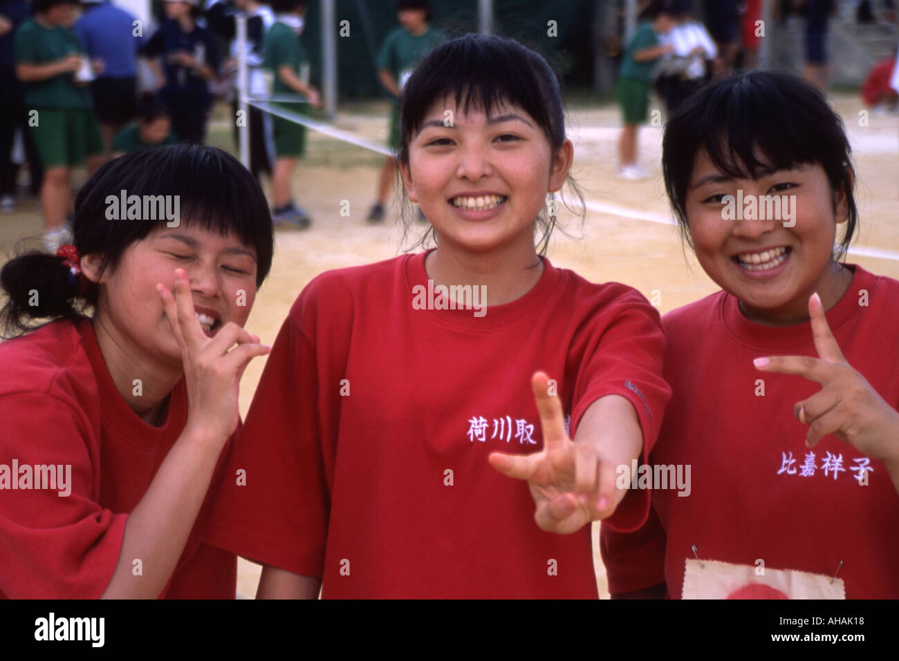 Japanese high school girls pose for the camera on their sports day Stock Photo Alamy