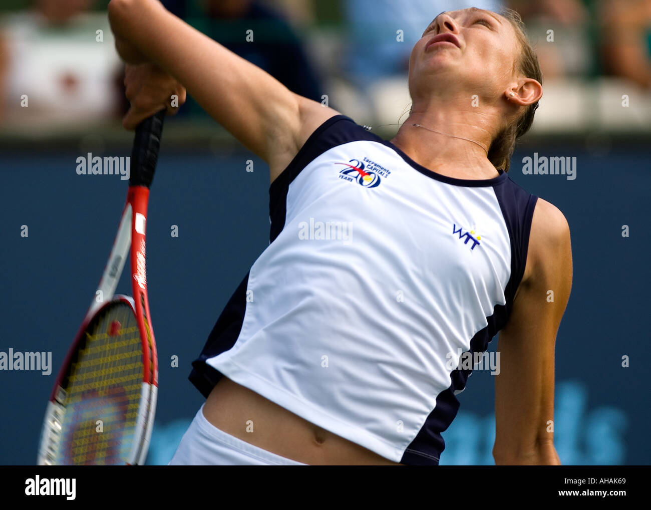 Elena Likhovtseva, WTA professional tennis player serves during tournament play. Stock Photo