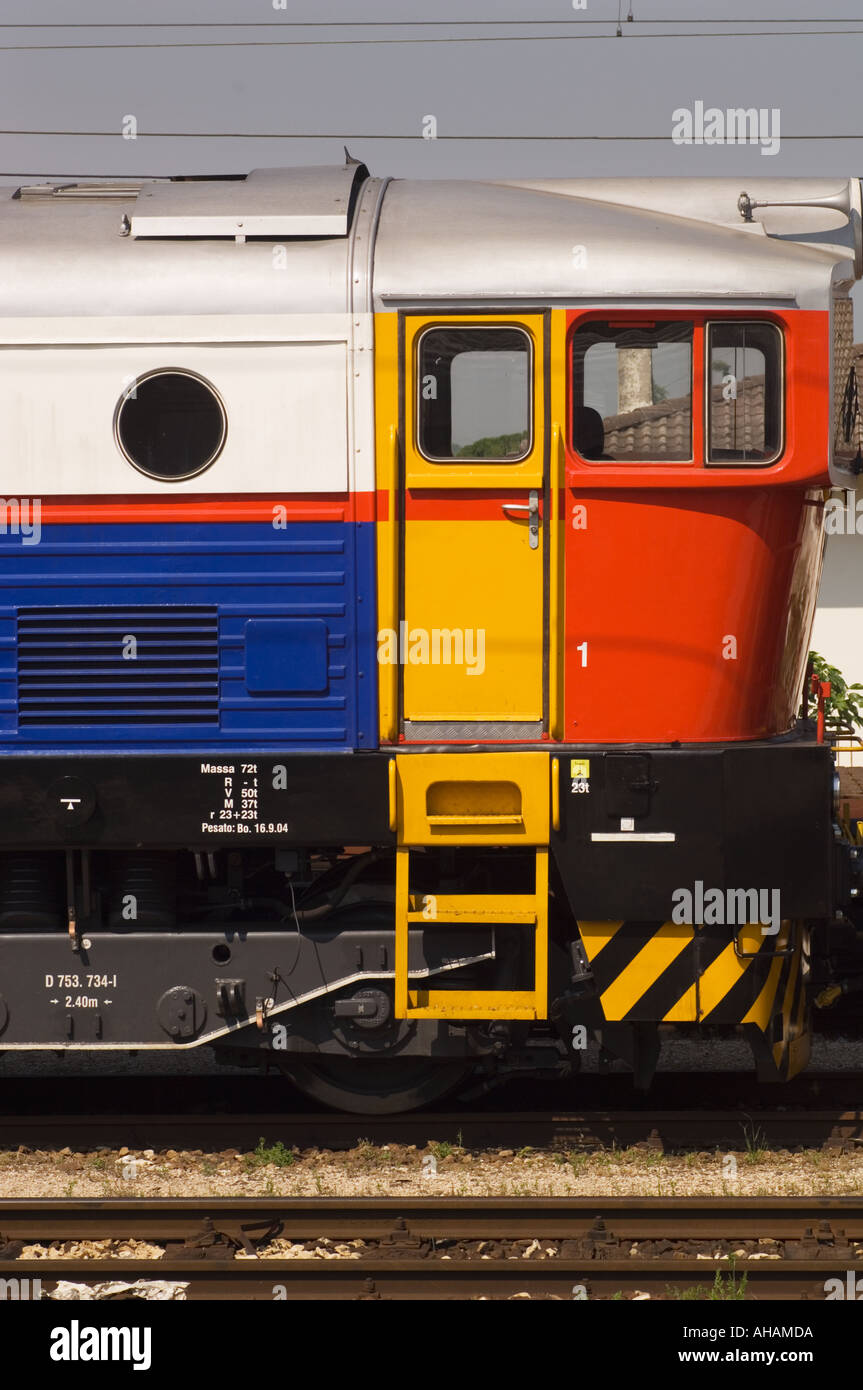 Color vertical image of a colorful Italian train locomitive engine in ...