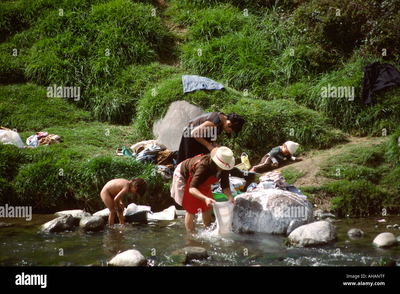 Ecuador Cuenca laundry washing clothes in the river Stock Photo Alamy