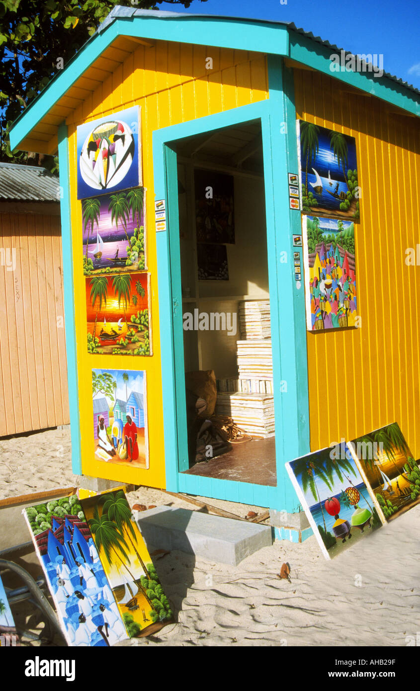 Beach stall selling local paintings Deep Bay Antigua Caribbean Stock