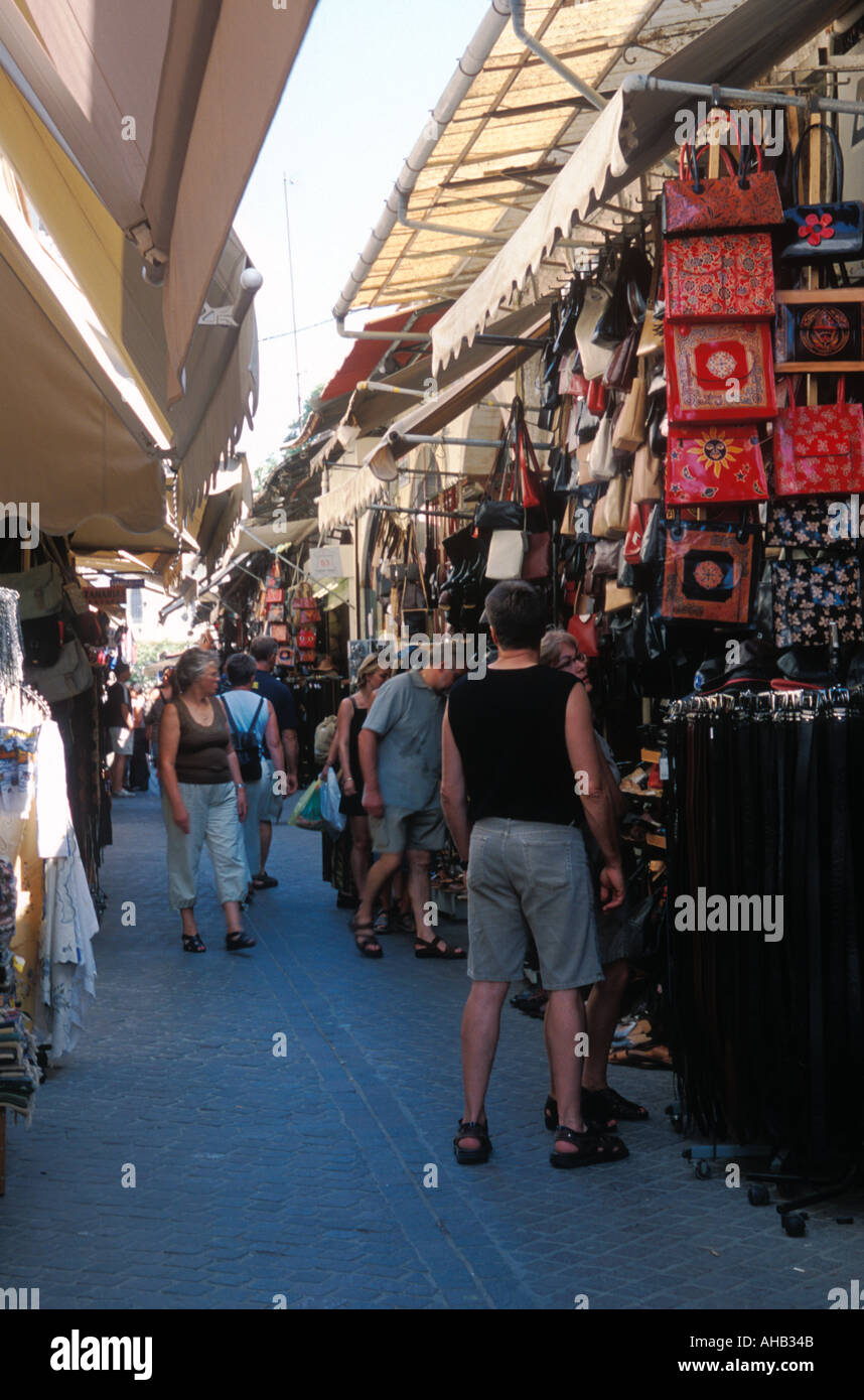 Narrow street of shops selling leather goods Chania Greece Stock Photo