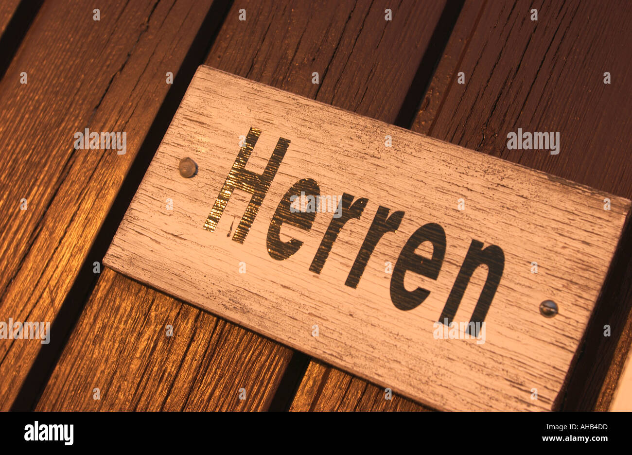 Sign of a mens restroom in german Stock Photo Alamy