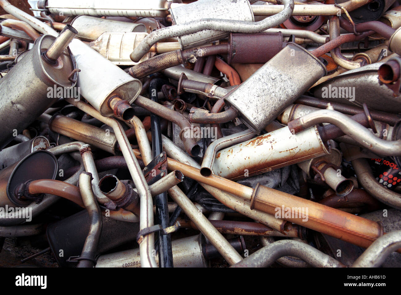 Pile of used exhaust pipes Stock Photo Alamy