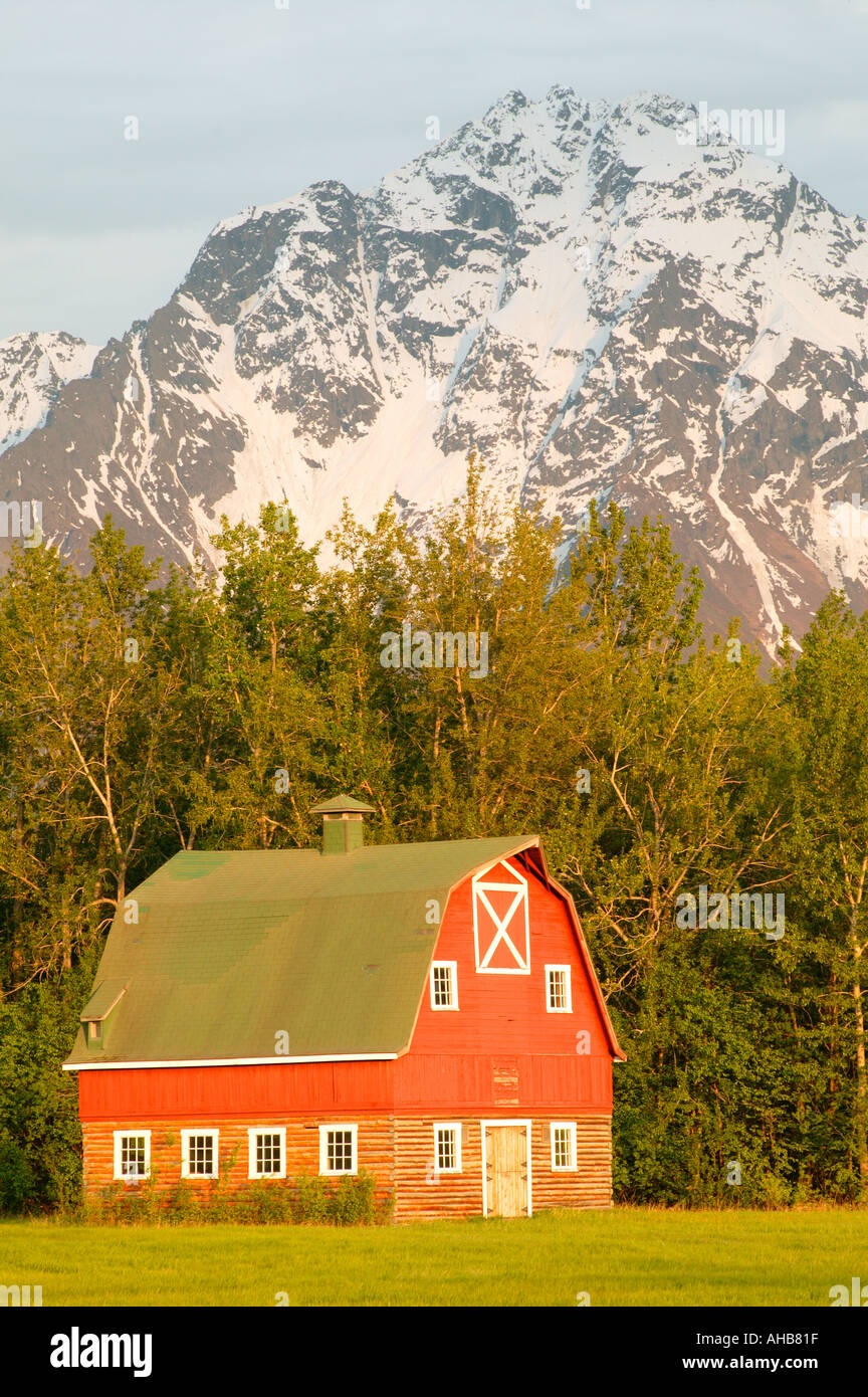 Red barn with Pioneer Peak in the background Skyview Ranch Palmer Alaska Stock Photo