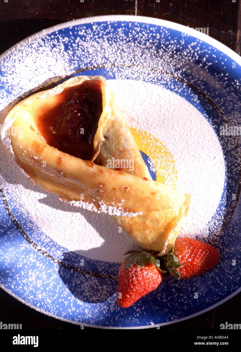 Crï¿½pe souzette with strawberry jam Italy Stock Photo Alamy