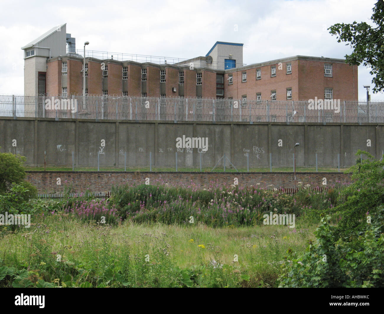 Saughton Prison (HMP Edinburgh) as seen from the Water of Leith Walkway, Edinburgh, Scotland, UK. Stock Photo