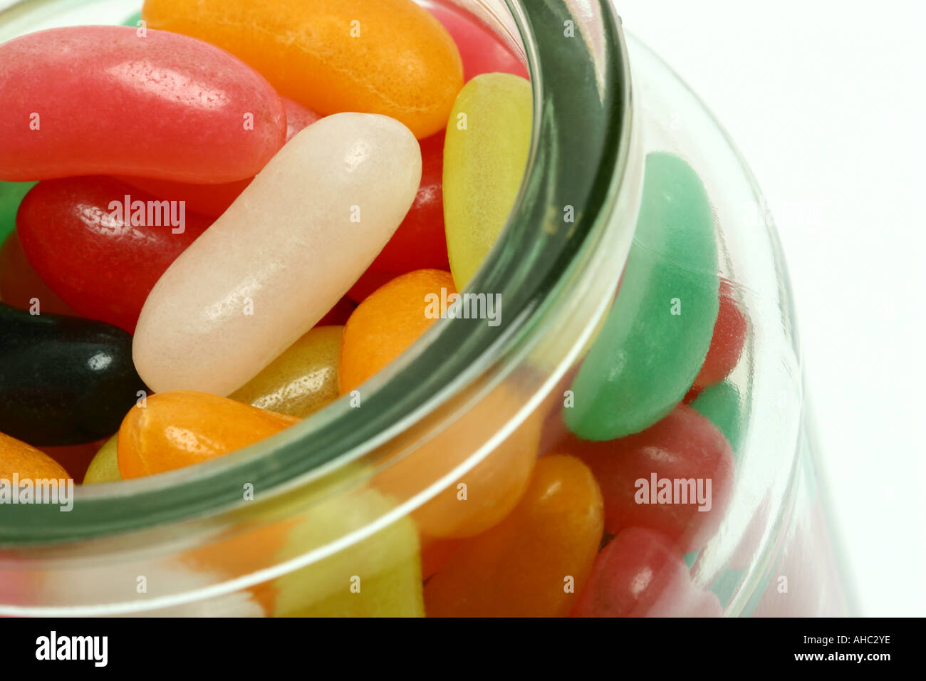 Multi Coloured Jelly Beans in a glass jar Stock Photo