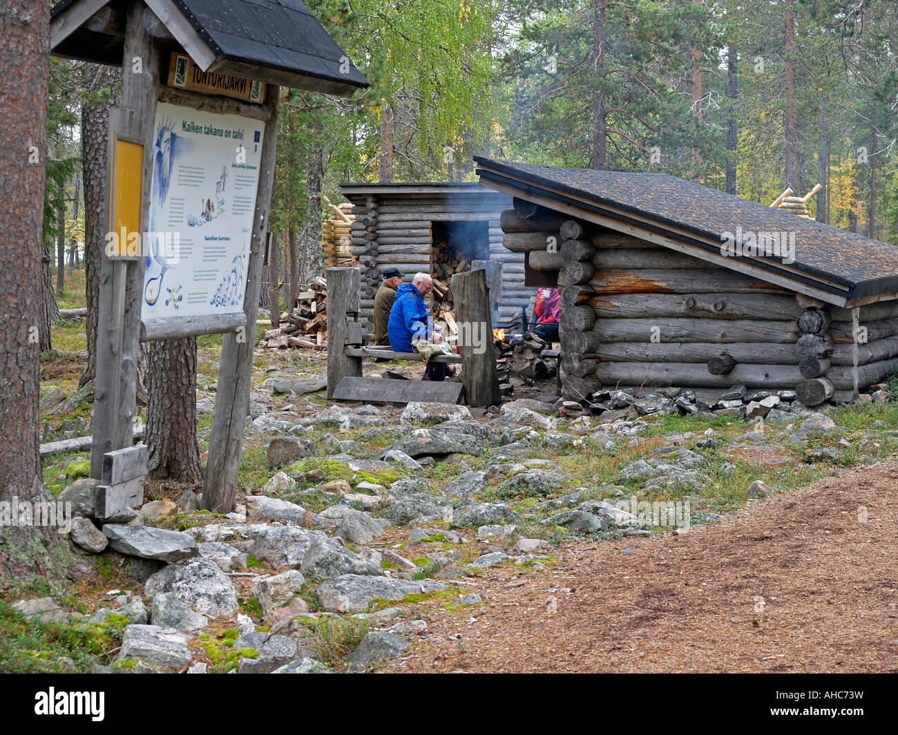 people having a break at a refuge by trekking in Yllas Pallastunturi Nationalpark Lapland Finland Stock Photo