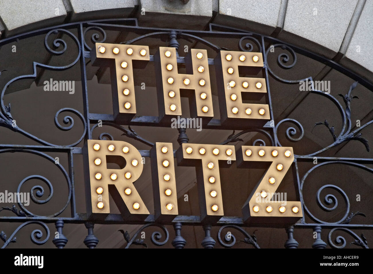 Illuminated sign and carving sculpture outside The Ritz Hotel London SW1 England Stock Photo