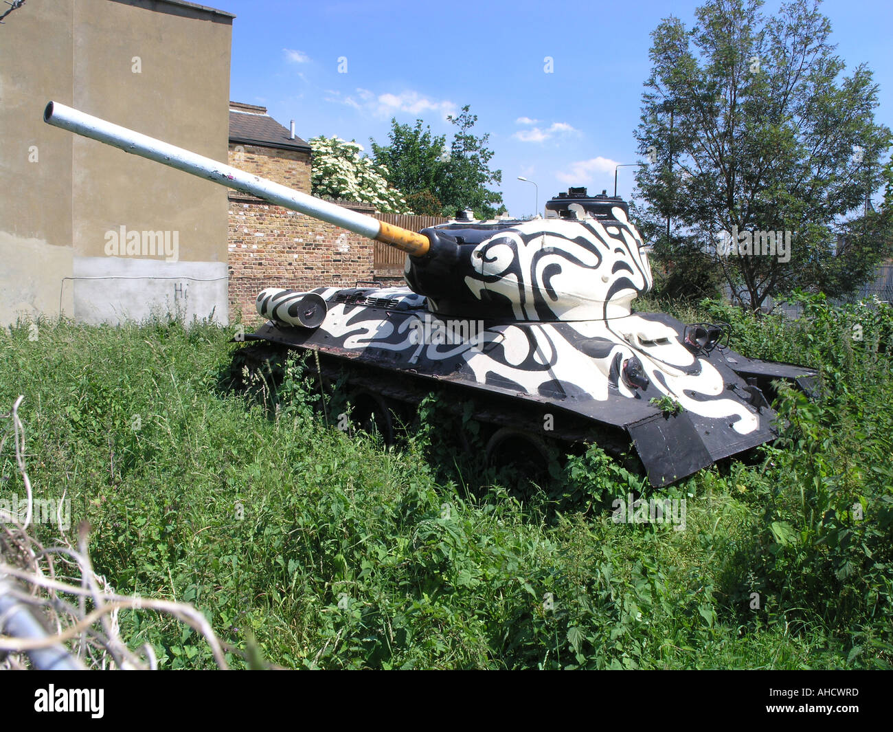 Russian T-34 tank parked on derelict land at the corner of Pages Walk and Mandala Way in Bermondsey London SE1 Stock Photo